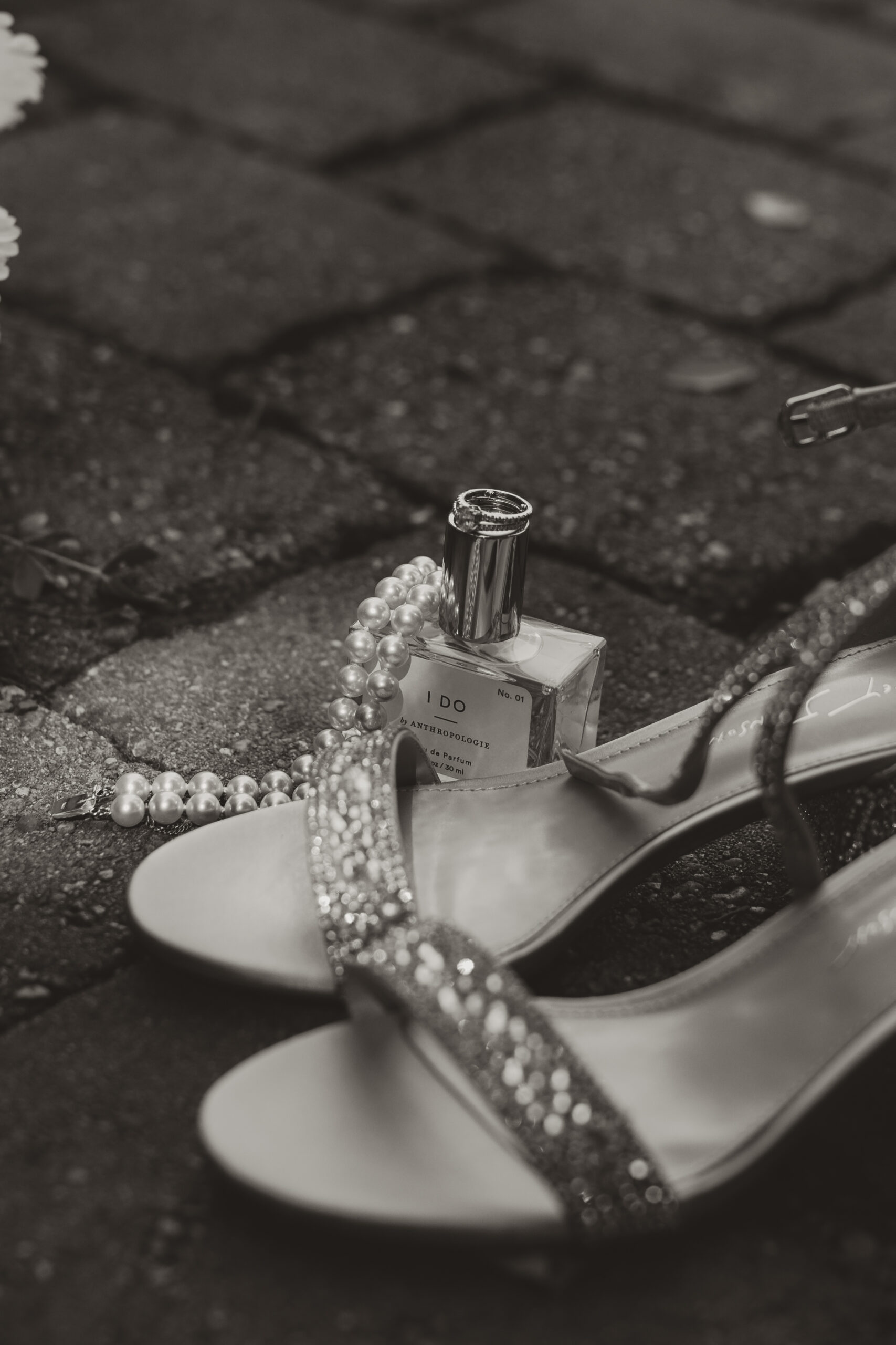 wedding day shoes and necklace and perfume