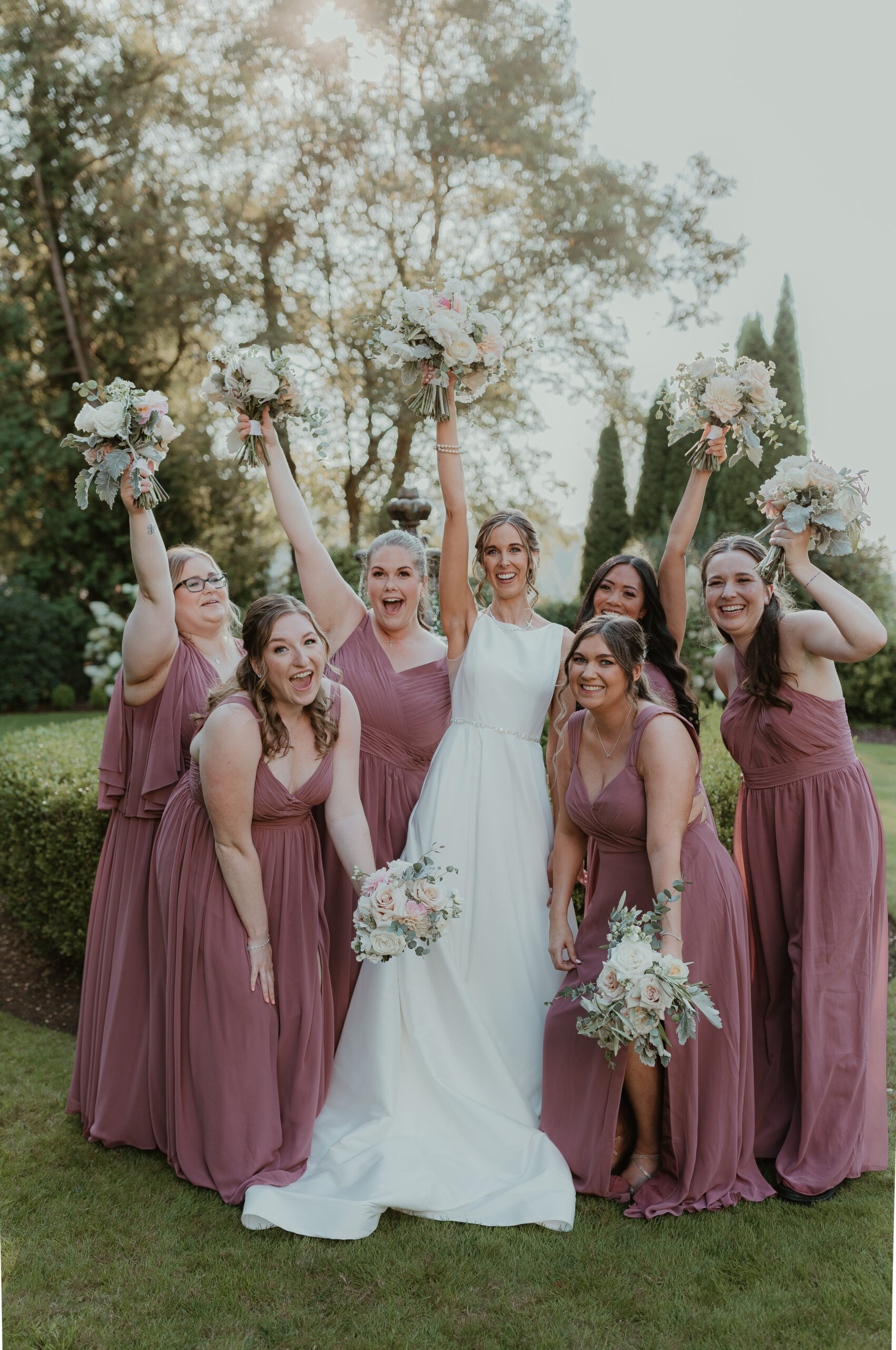 bride and her bridesmaids celebrating