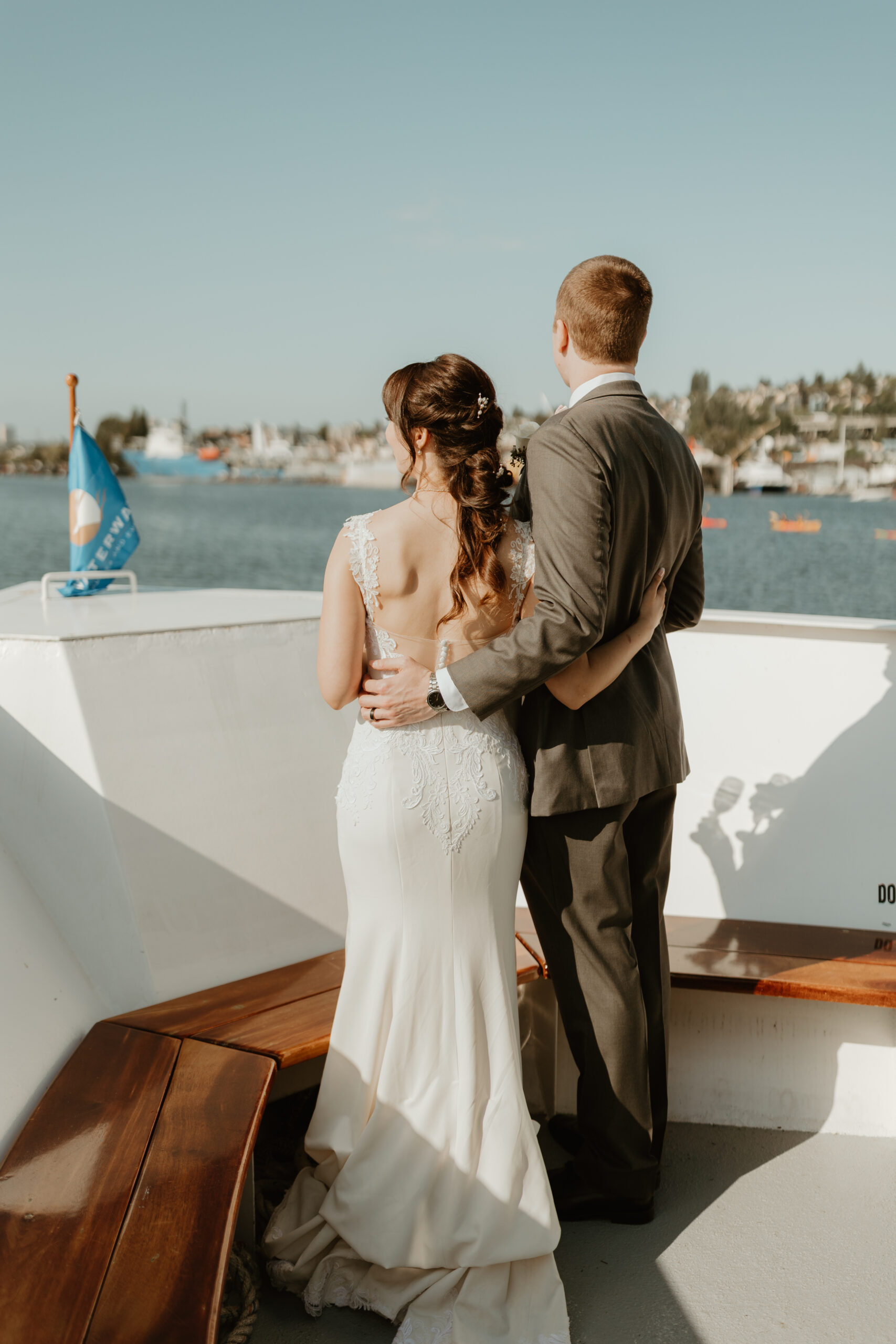 bride and groom on a yacht in seattle