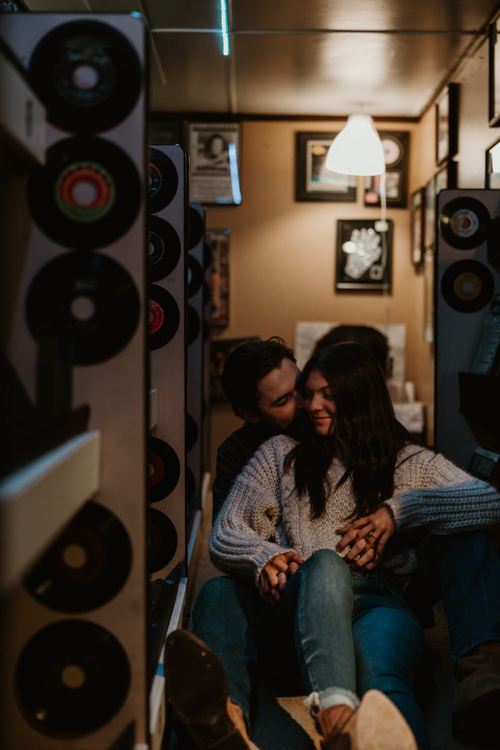 couple sitting together in a record store in centralia washington