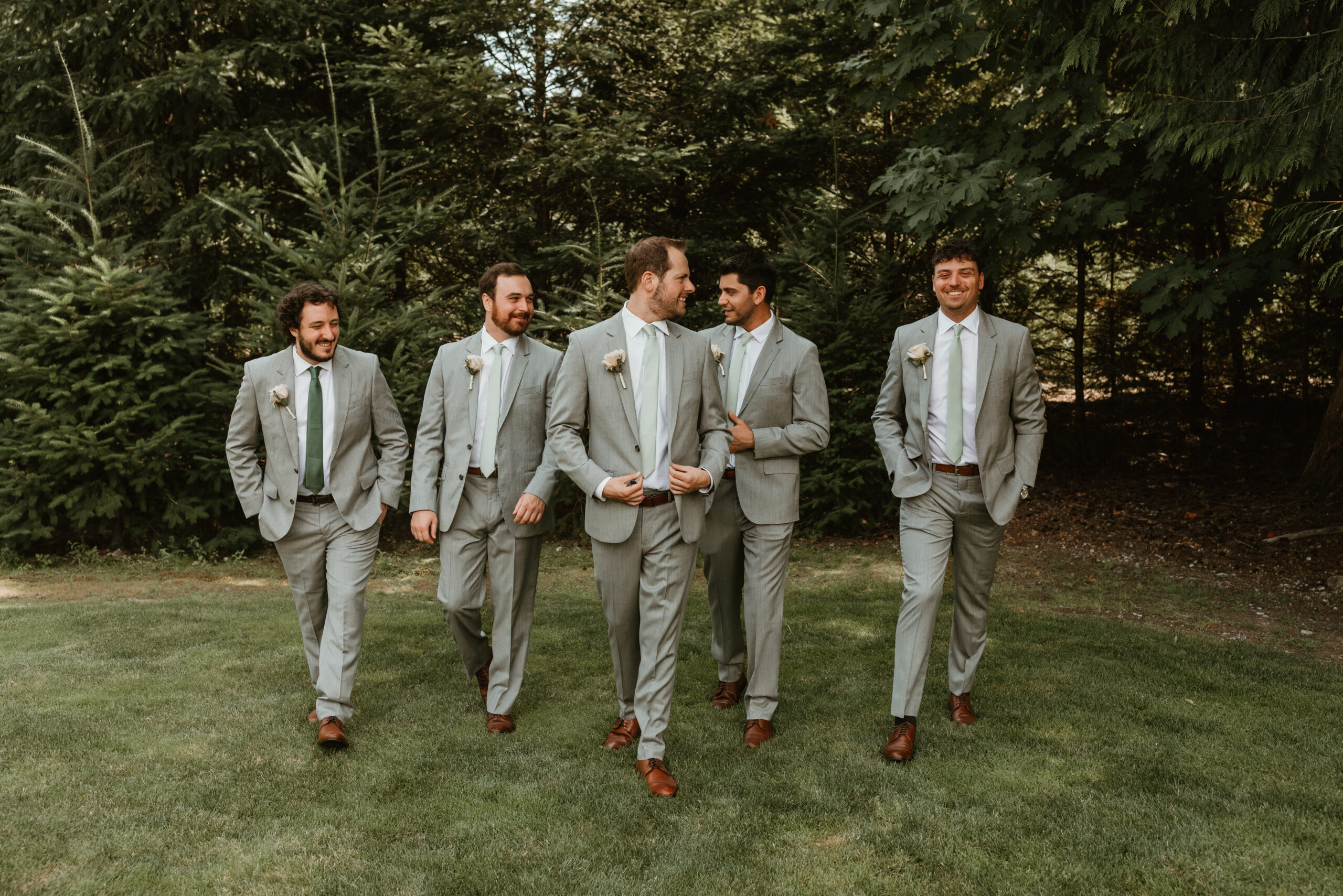 groom walking with his groomsmen