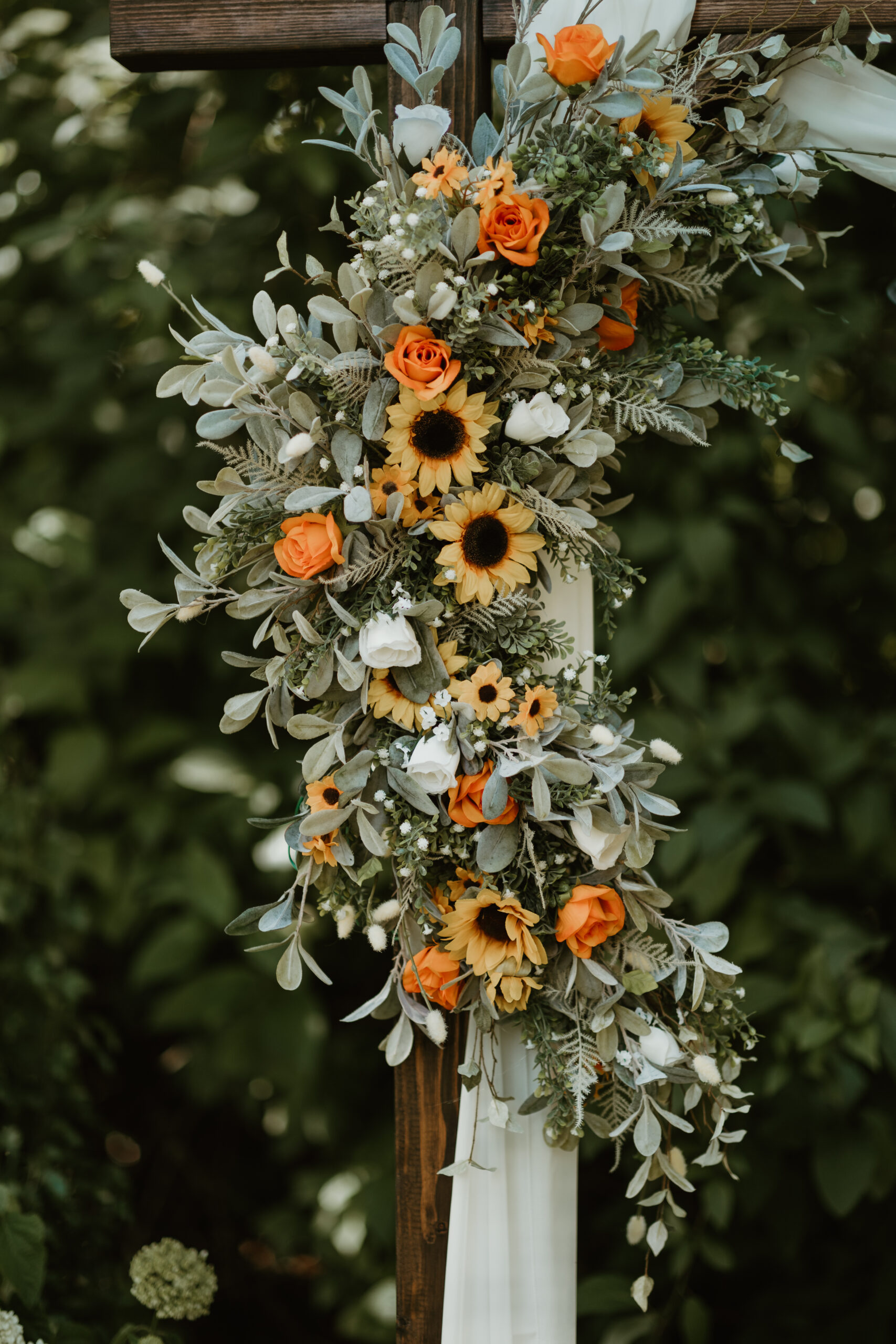 wedding flowers tied to a post