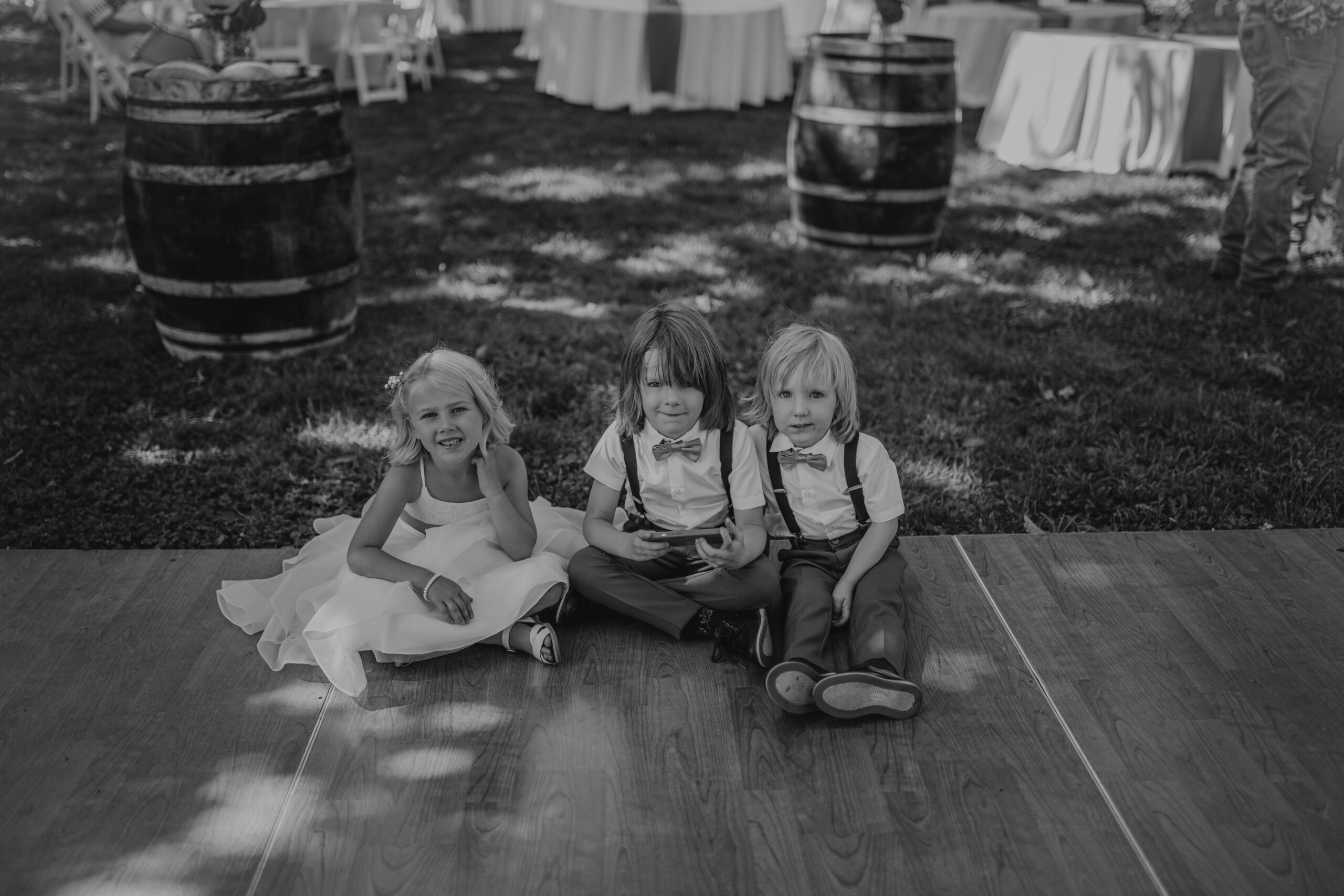 flower girl and ring bearers smiling